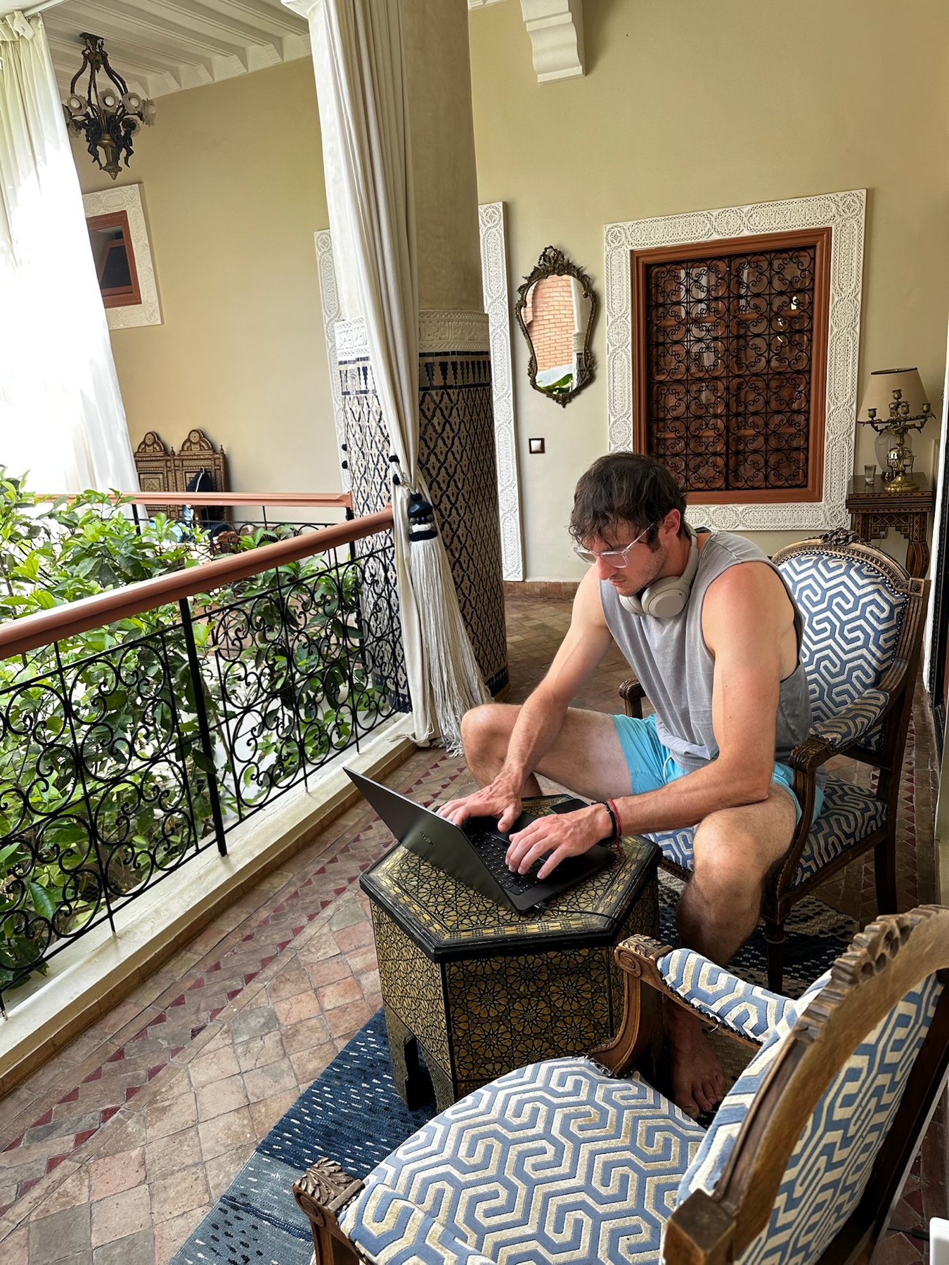 Chris working on his online coaching business